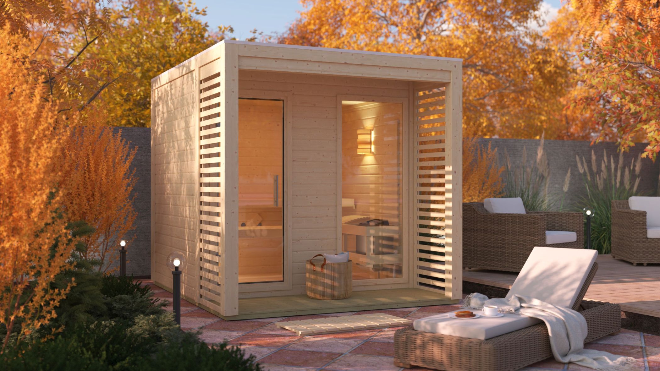 Karibu Saunahaus Angkor 2 als Gartensauna aus Massivholz im Garten mit Glasfront