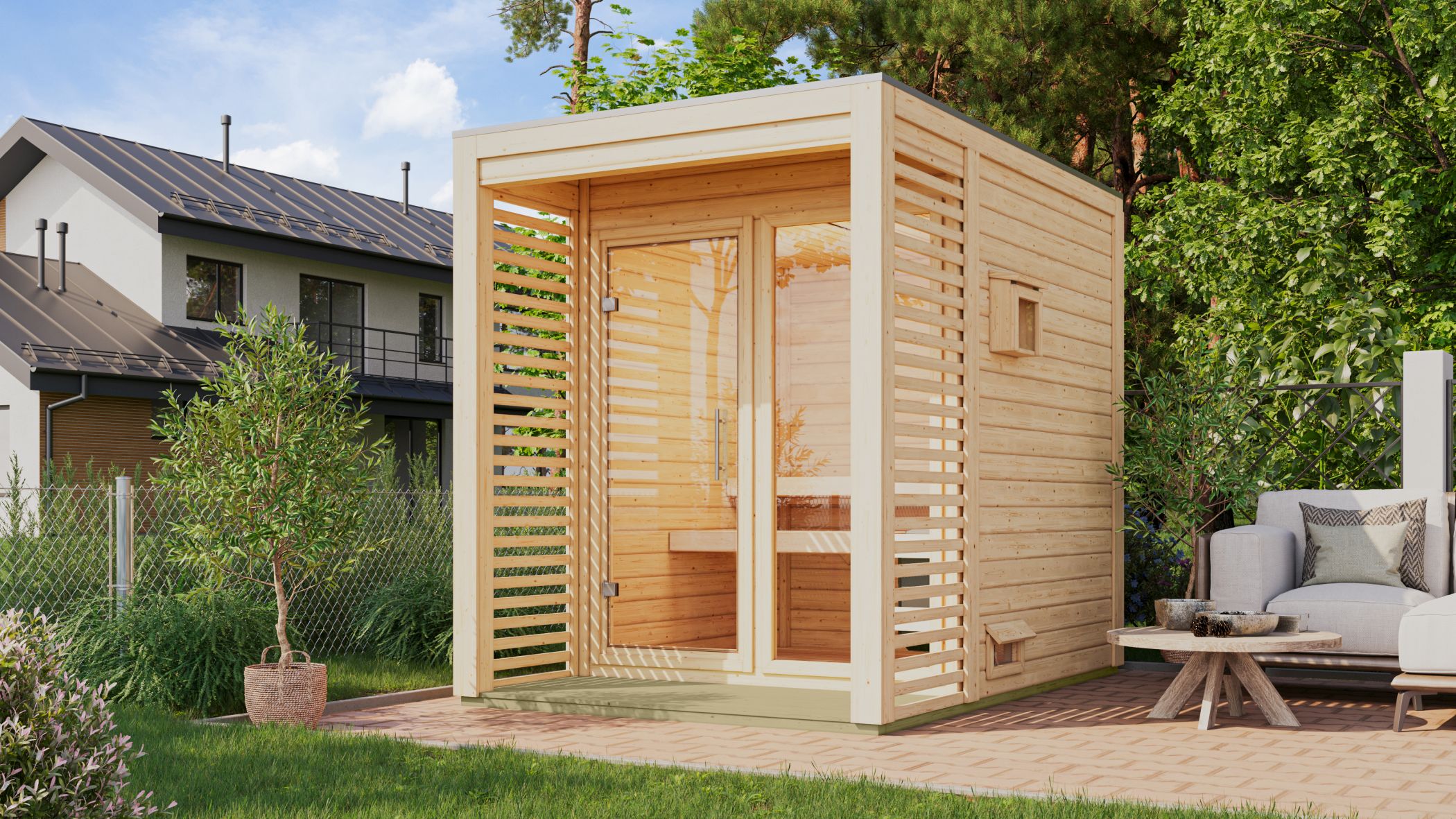 Karibu Saunahaus Angkor 1 als Gartensauna aus Massivholz im Garten mit Glasfront