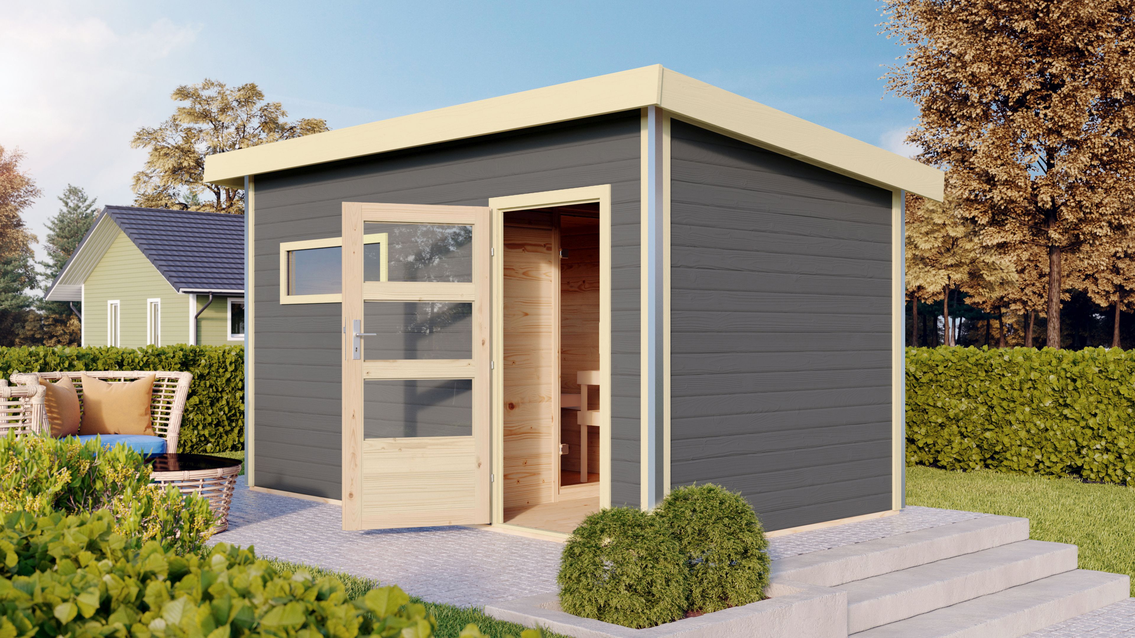 Karibu Saunahaus Skrollan 2 mit Vorraum als Gartensauna aus Massivholz im Garten mit Glasfront