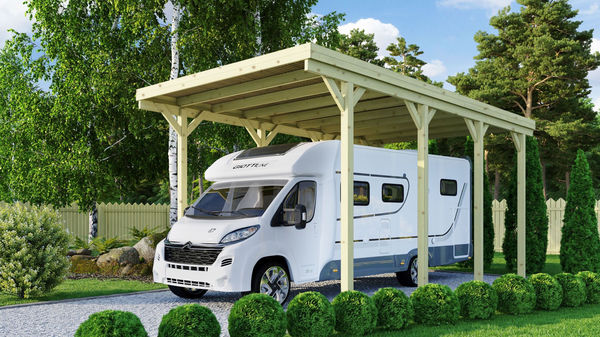 Karibu Caravan Carport aus KDI-Massivholz mit Flachdach im Garten aufgebaut