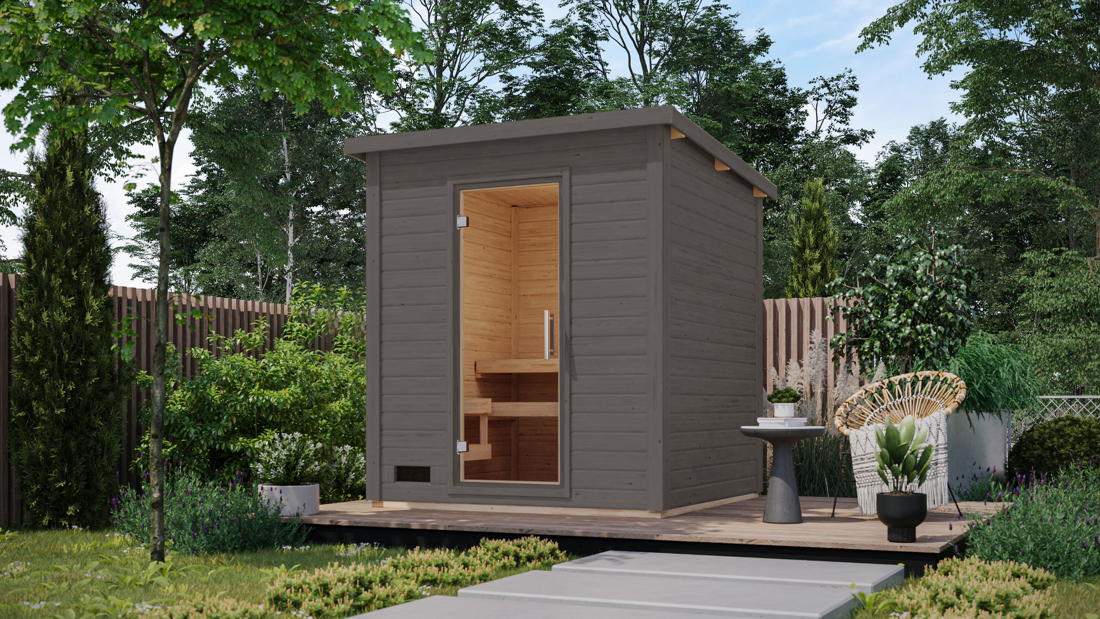 Karibu Saunahaus Hytti 2 Exclusive als Gartensauna aus Massivholz im Garten mit Glasfront