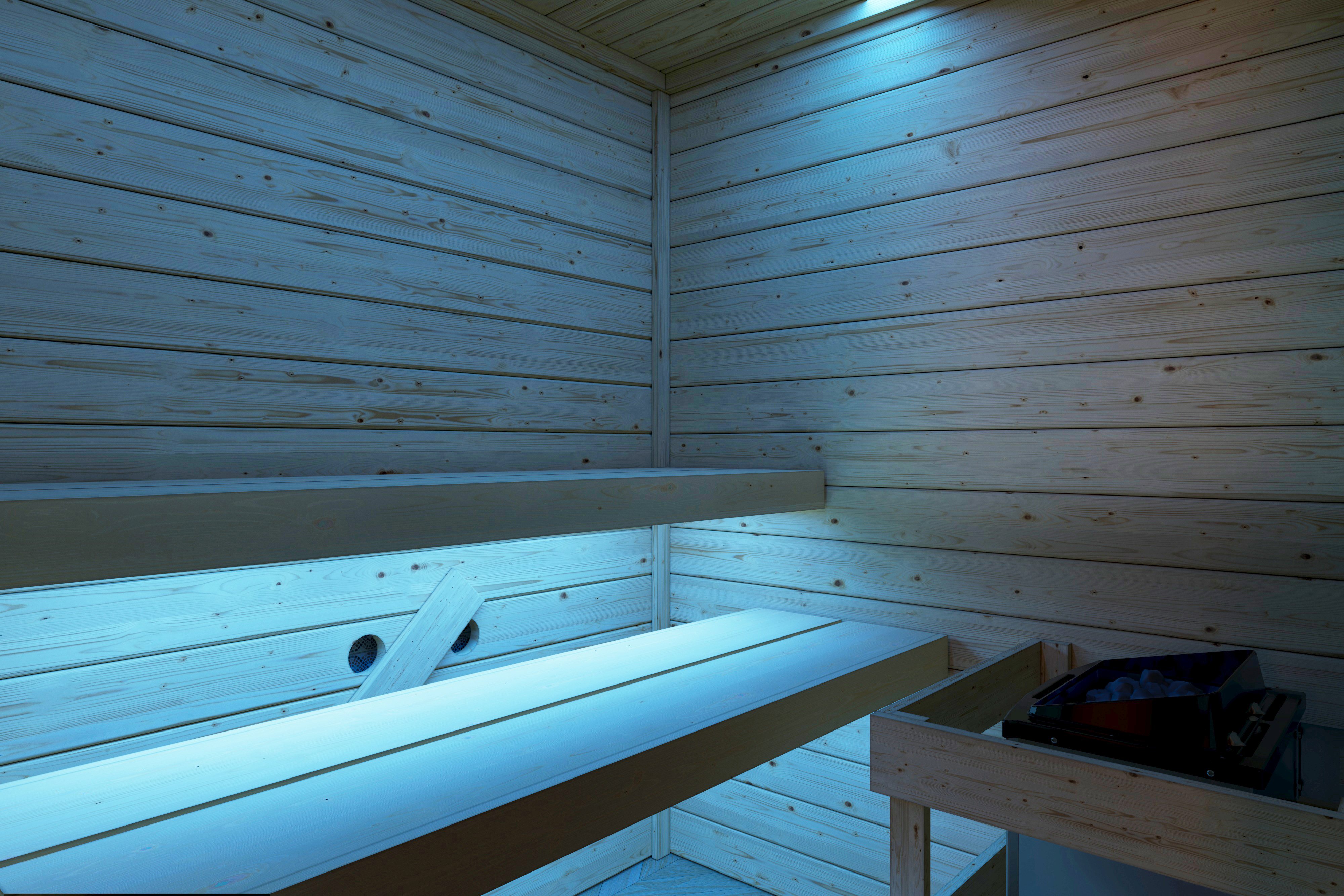 Karibu Sauna Eda als stimmungsvoller Wellnessbereich in einem modern eingerichteten Wohnraum