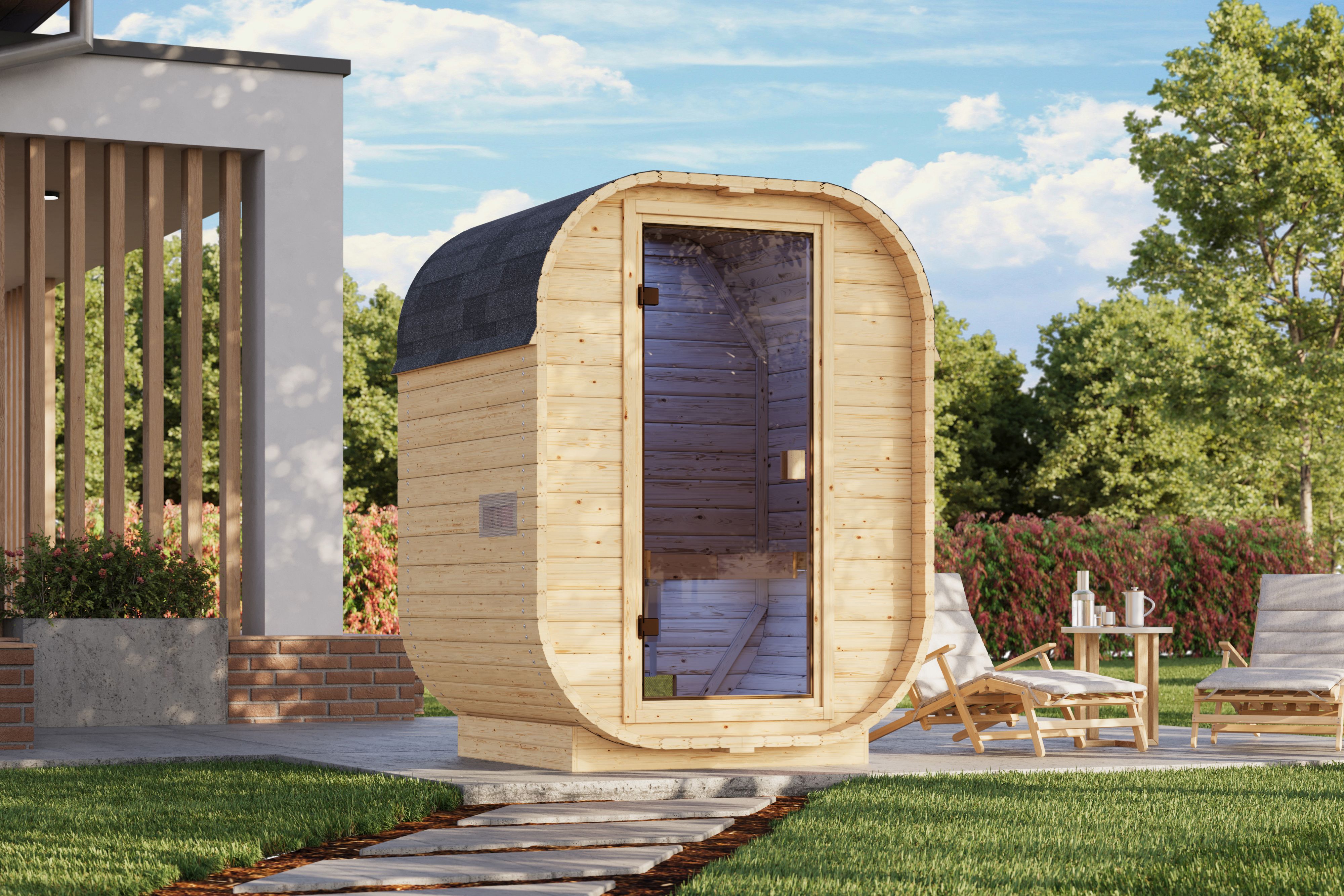 Karibu Fasssauna Quadro Mini Basic als stimmungsvoller Wellnessbereich im Garten aufgebaut