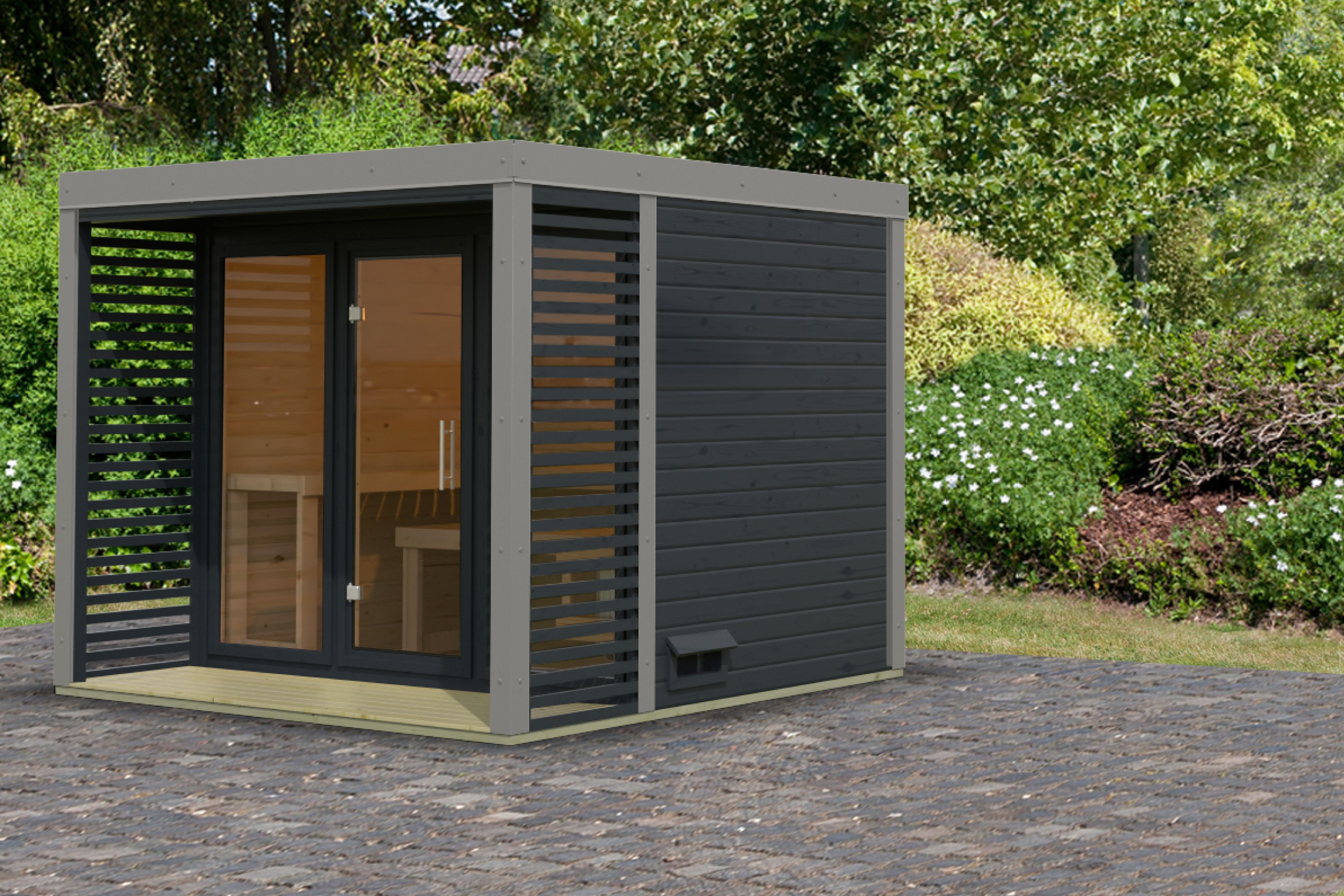 Karibu Saunahaus Ares 3 als Gartensauna aus Massivholz im Garten mit Glasfront