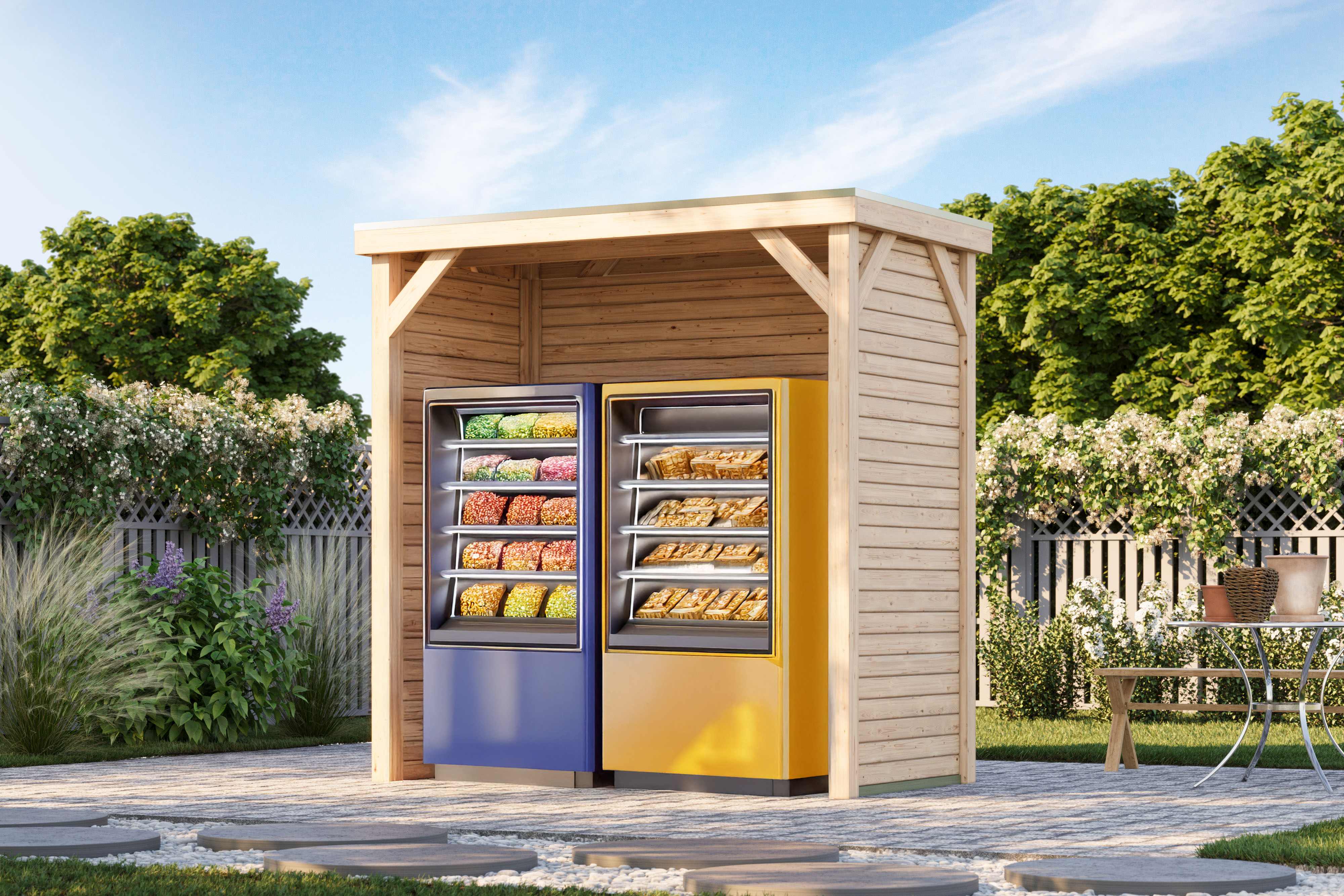 Karibu Grillpavillon aus Leimholz mit Flachdach im Garten als Ambiente-Ansicht