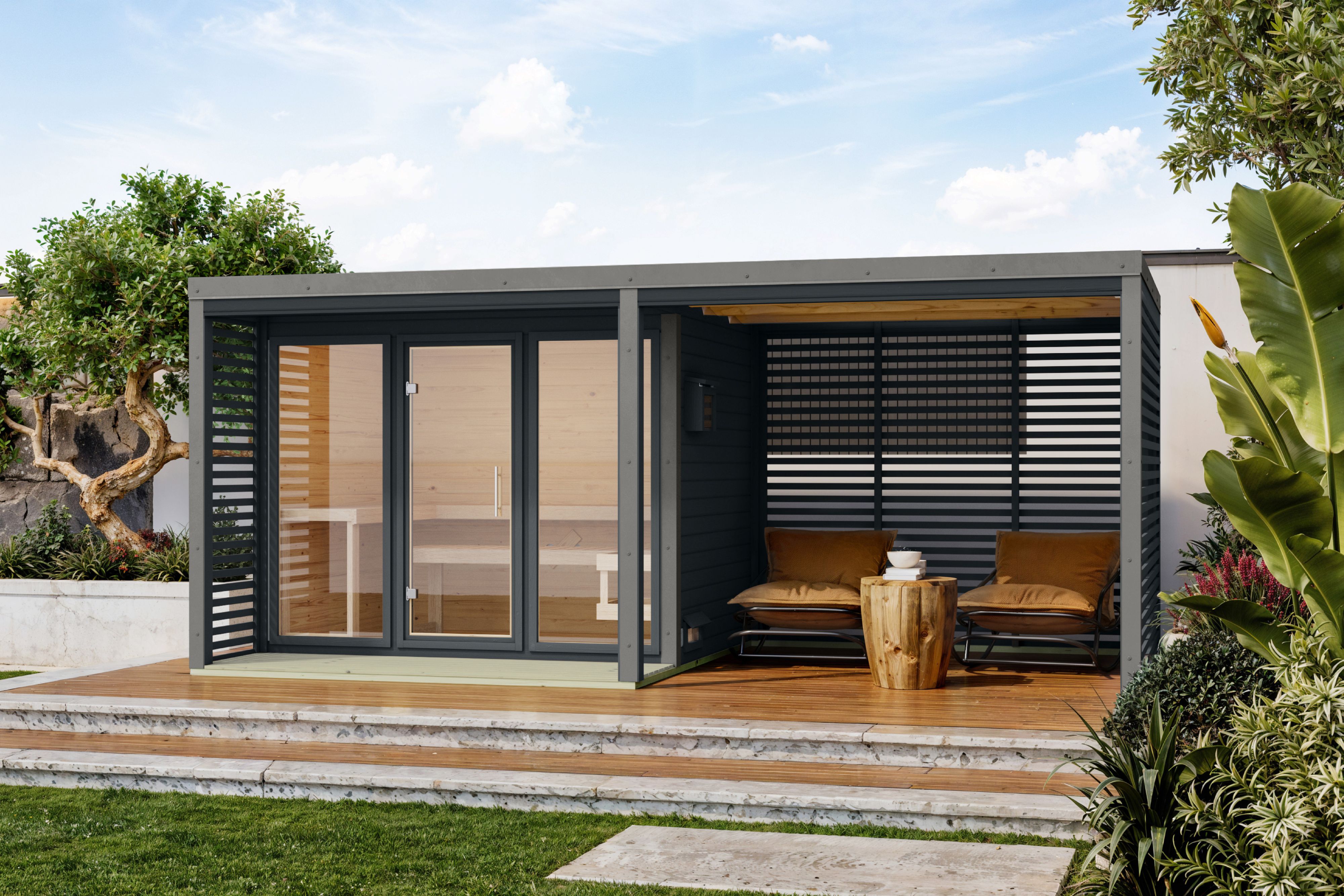 Karibu Saunahaus Ares 3 mit 2,70 m Anbaudach als Gartensauna aus Massivholz im Garten mit Glasfront