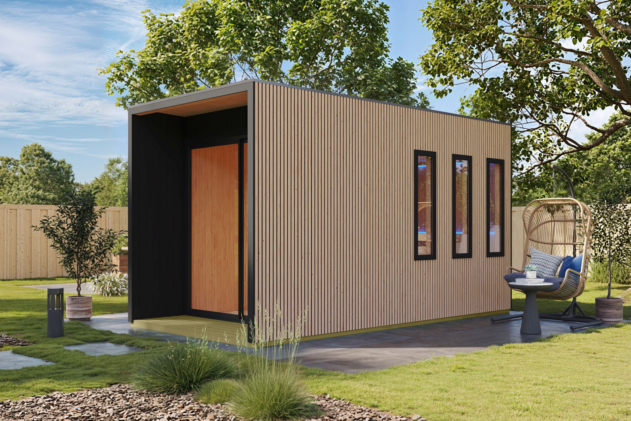 Karibu Saunahaus Miramar Douglasie als Gartensauna aus Massivholz im Garten mit Glasfront