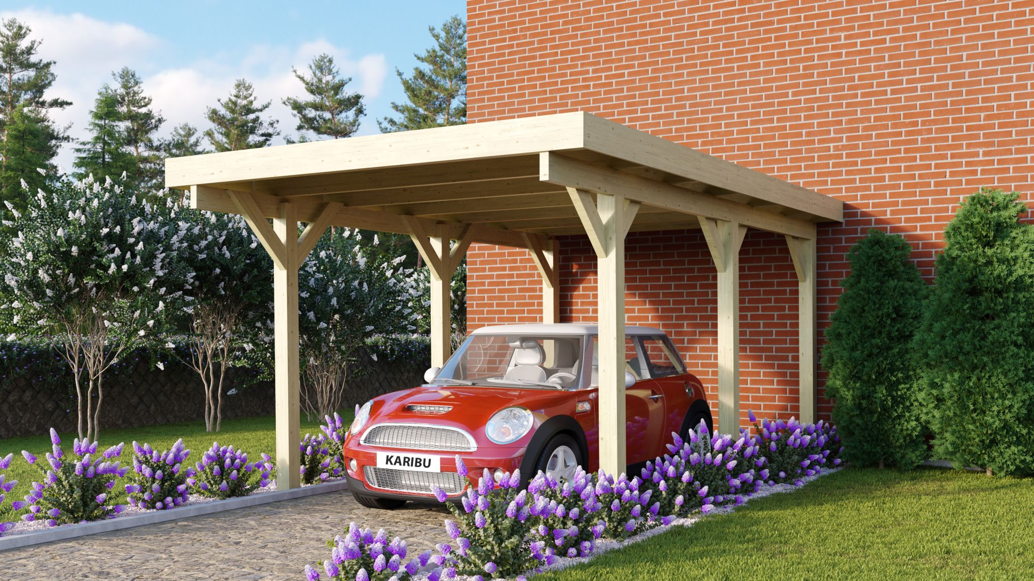 Karibu Einzelcarport Classic 1 aus KDI-Massivholz mit Flachdach im Garten aufgebaut