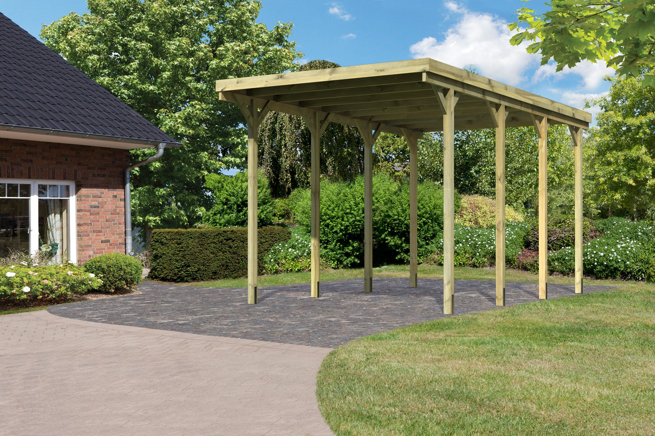 Außenansicht des Karibu Caravan Carport aus KDI-Massivholz mit Flachdach im Garten aufgebaut